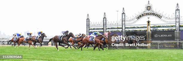 Dance To Dubai ridden by Carleen Hefel wins the VRC Member Rebecca Sutherland Sprint at Flemington Racecourse on July 15, 2023 in Flemington,...