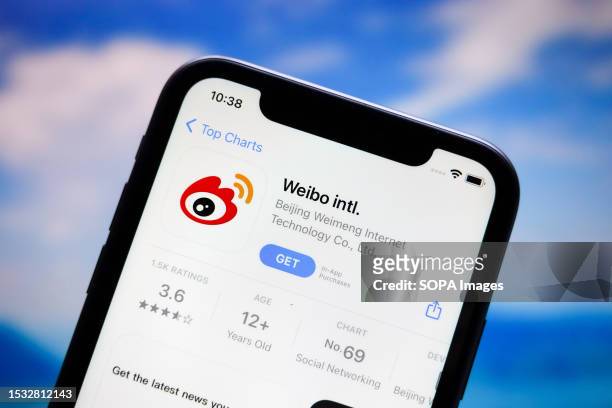 In this photo illustration, the logo of the Weibo app is displayed in the Apple Store for iphones.