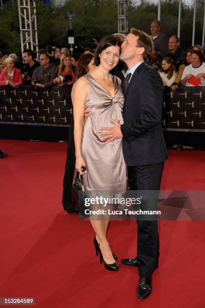 Anna Theis and Wotan Wilke Moehring arrive for the German TV Award 2012 at the Coloneum on October 2, 2012 in Cologne, Germany.