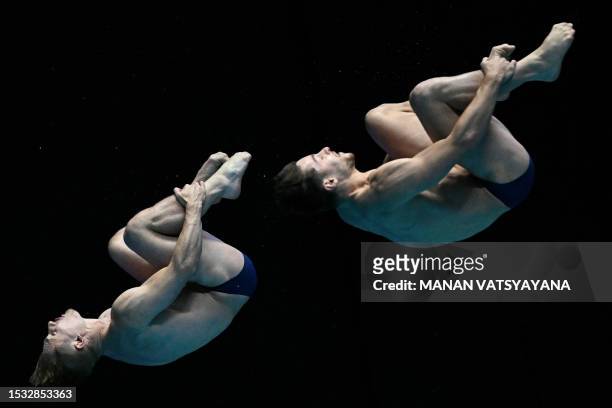 Britain's Anthony Harding and Jack Laugher compete in the final of the men's 3m synchronised diving event during the World Aquatics Championships in...