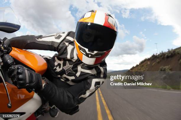 motorcycle racer going fast. - helmet ストックフォトと画像