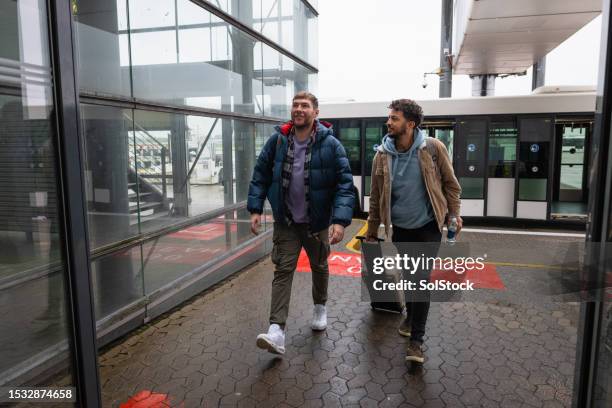 using an airport shuttle bus - airport shuttle stock pictures, royalty-free photos & images