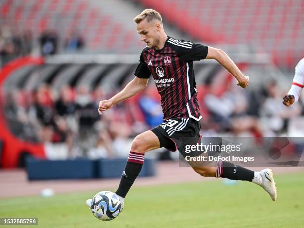 Tim Handwerker controls the Ball during the pre-season friendly match between 1. FC Nürnberg and Arsenal FC at Max-Morlock Stadion on July 13, 2023...