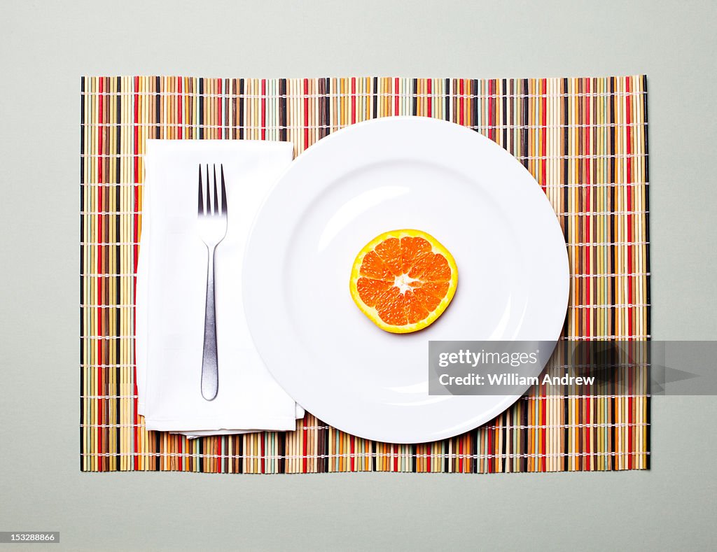 Orange slice on a plate