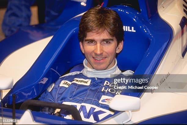 Damon Hill of Great Britain sits in the new TWR Arrows car during the launch of the Arrows formula one car at the NEC in Birmingham. Mandatory...