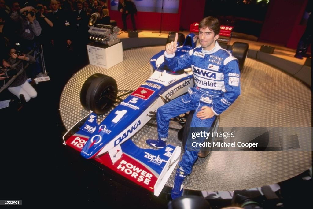 Damon Hill of Great Britain sits in the new car