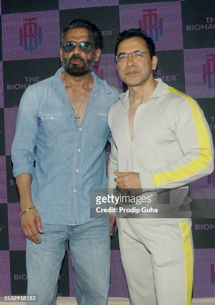 Suniel Shetty and Lalit Dharmani attend the launch of india first 'The Biohacker' facility machine on July 11, 2023 in Mumbai, India