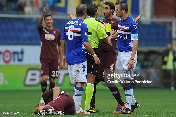 Rolando Bianchi of Torino FC discutes with referee Gianpaolo Calvarese during the Serie A match between UC Sampdoria and Torino FC at Stadio Luigi...
