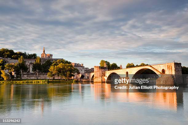 the pont d'avignon and the rhone river. - rhone river stock pictures, royalty-free photos & images