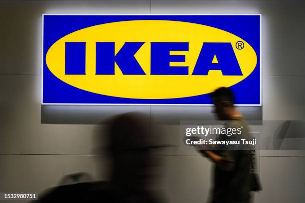 People walk pass an Ikea logo in Ikea store on July 15, 2023 in Hong Kong, China.