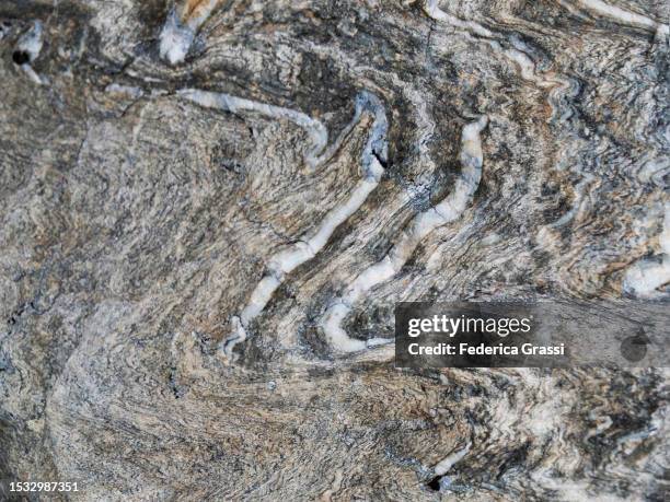 twisted patterns in eroded rocks in the rhaetian alps - viamala stock pictures, royalty-free photos & images