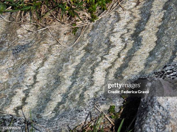 twisted patterns in eroded rocks in the rhaetian alps - viamala stock pictures, royalty-free photos & images