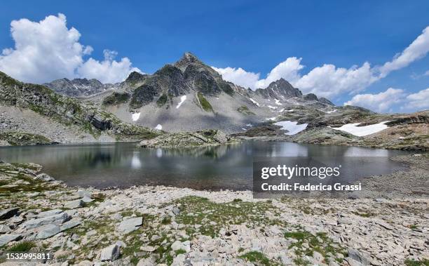 view of lago ghiacciato in the rhaetian alps - viamala stock pictures, royalty-free photos & images