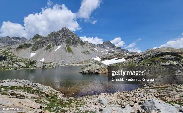 view of lago ghiacciato in the rhaetian alps - viamala stock pictures, royalty-free photos & images