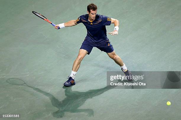 Andy Murray of Great Britain plays a forehand in his second round match against Lukas Lacko of Slovakia during day three of the Rakuten Open at...