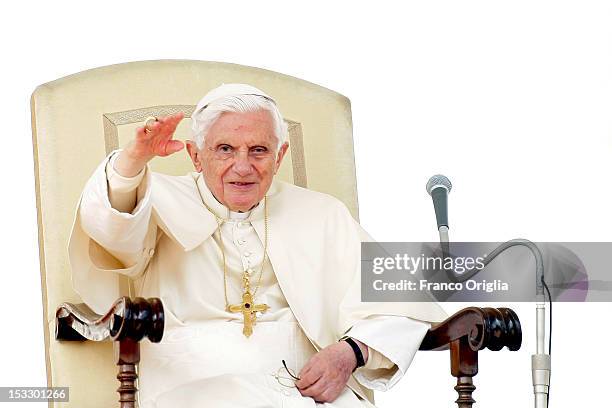 Pope Benedict XVI waves to the faithful gathered in St. Peter's square during his weekly audience on October 3, 2012 in Vatican City, Vatican. The...
