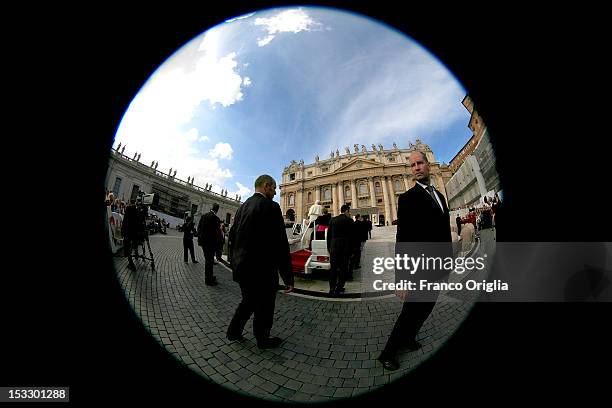 Pope Benedict XVI arrives on the popemobile in St. Peter's square for his weekly audience on October 3, 2012 in Vatican City, Vatican. The trial of...