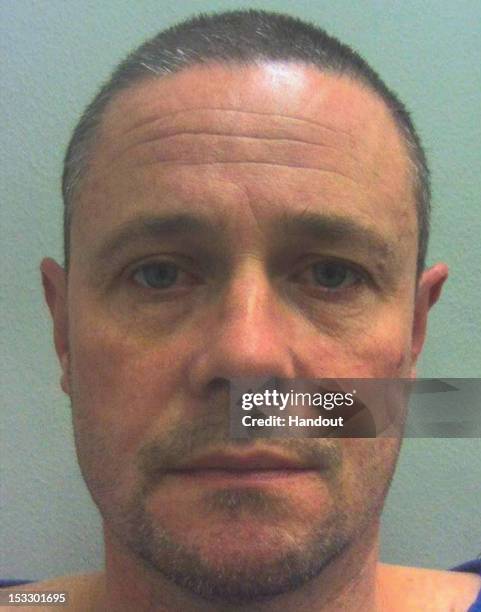 In this handout image supplied by Dyfed Powys Police, Mark Leonard Bridger is pictured following his arrest in Wales. 46-year-old Mark Bridger was...