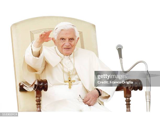 Pope Benedict XVI waves to the faithful gathered in St. Peter's square during his weekly audience on October 3, 2012 in Vatican City, Vatican. The...