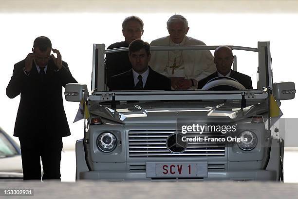 Pope Benedict XVI arrives on popemobile in St. Peter's square for his weekly audience on October 3, 2012 in Vatican City, Vatican. The trial of the...