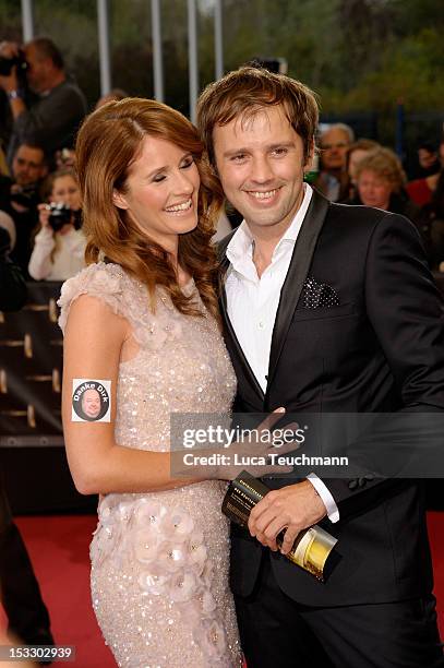 Arne Schoenfeld and Mareile Hoeppner attends the German TV Award party 2012 at Coloneum on October 2, 2012 in Cologne, Germany.