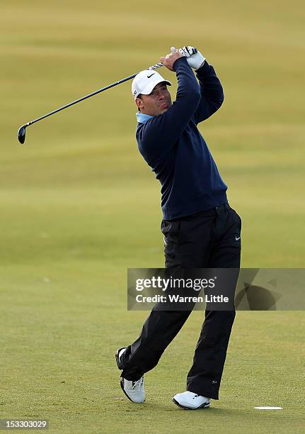 Rugby player, Schalk Brits of South Africa practices during the practice round of The Alfred Dunhill Links Championship at The Old Course on October...