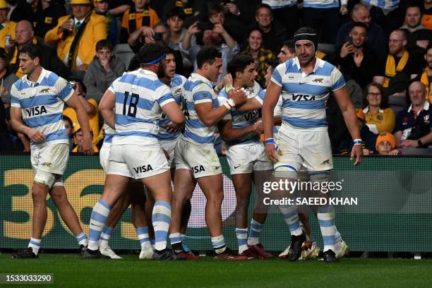 Argentina's Mateo Carreras celebrates his try with teammates during the Rugby Championship match between Argentina and Australia at Commbank Stadium...