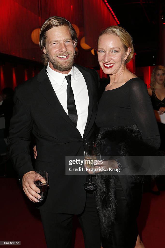 Henning Baum and his wife Corinna Baum attend the German TV Award