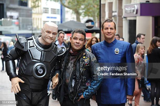 Robert Llewellyn as Kryten, Craig Charles as Dave Lister and Chris Barrie as Arnold Rimmer attend a photocall for the return of Red Dwarf with a new...