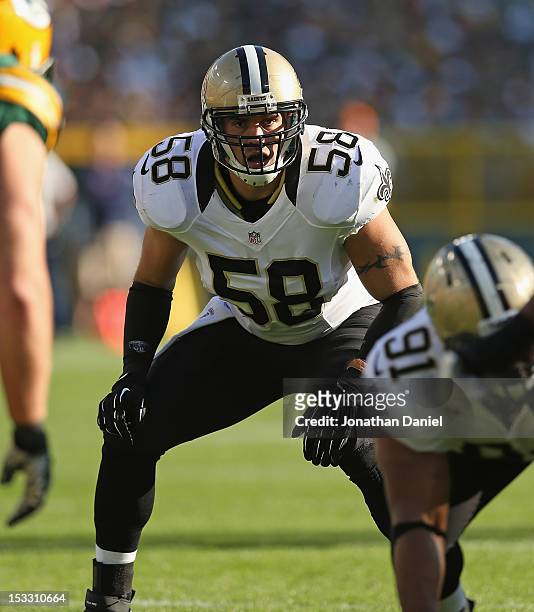 Scott Shanle of the New Orleans Saints awaits the snap against the Green Bay Packers at Lambeau Field on September 30, 2012 in Green Bay, Wisconsin....
