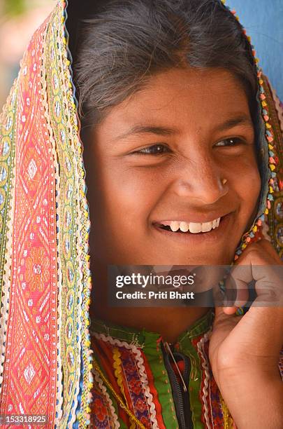 smiling indian woman - priti bhatt stock-fotos und bilder