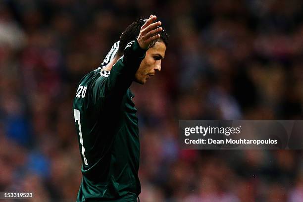 Cristiano Ronaldo of Real celebrates after he scores the third goal of the game during the UEFA Champions League Group D match between Ajax Amsterdam...