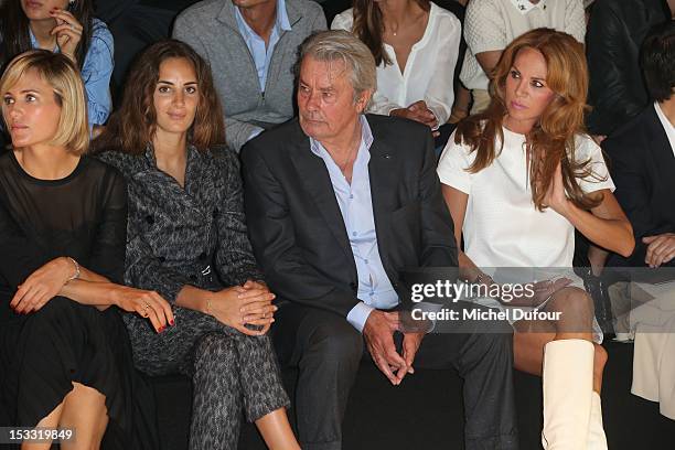 Judith Godreche, Alexia Niedzielski, Alain Delon and Rosalie van Breemen attend the Elie Saab Spring/Summer 2013 show as part of Paris Fashion Week...