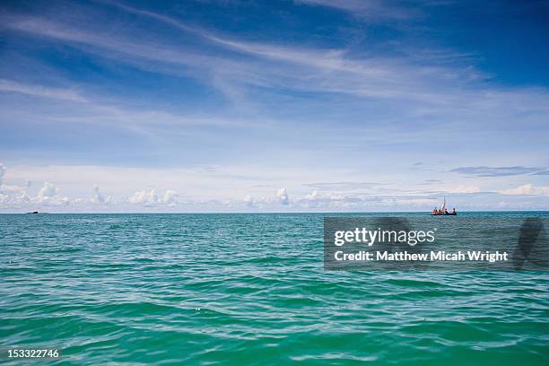 sailing on a makeshift handmade raft. - makeshift raft stock pictures, royalty-free photos & images