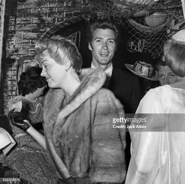 American actor Clint Eastwood with his first wife Maggie Johnson at a charity costume ball in aid of the Thalian organization, held at Lucy's...