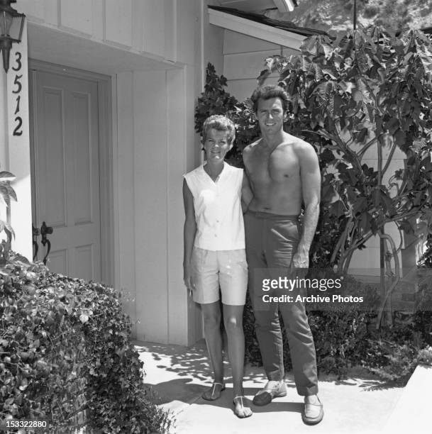 American actor Clint Eastwood with his first wife Maggie Johnson at their home in the Hollywood Hills, Los Angeles, California, circa 1960.