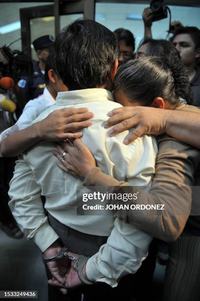 Reyes Collin Gualip is embraced by relatives before being sentenced to 6,060 years in prision on August 02, 2011 in Guatemala City. Collin was...