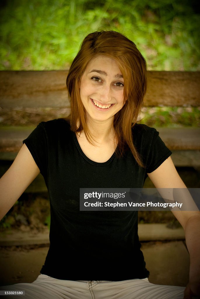 Smiling outdoor yoga girl