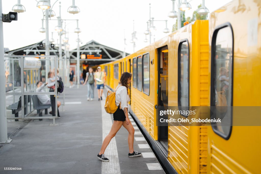 Woman embarking the train in Berlin