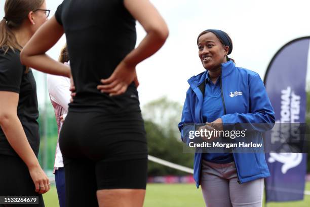 Paula Dunn, former Para Head Coach is seen talking to athletes at the The National Lottery X 2023 World Para Athletics Championships event at July...