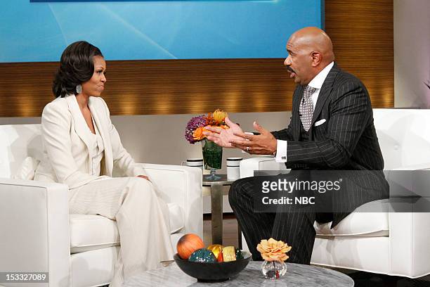 Pictured: First Lady Michelle Obama, host Steve Harvey --