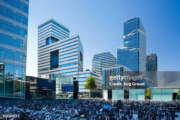 bike park place and modern office buildings - amsterdam foto e immagini stock