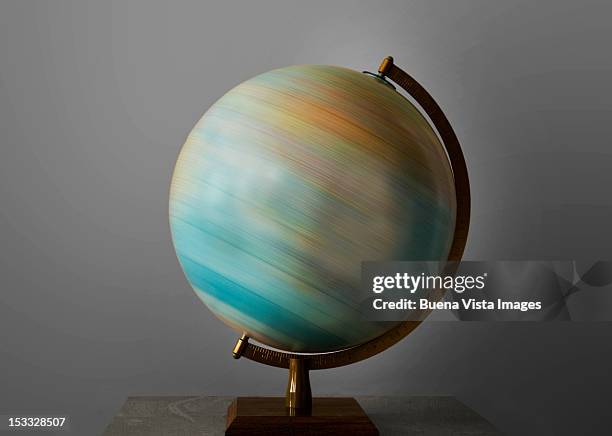 turning globe. - spinning stock pictures, royalty-free photos & images