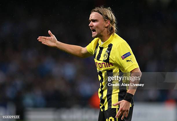 Marcel Schmelzer of Borussia Dortmund reacts during the UEFA Champions League Group D match between Manchester City and Borussia Dortmund at the...