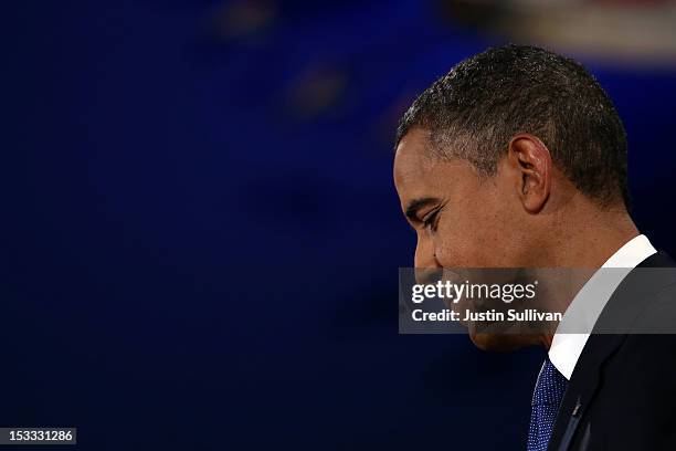 Democratic presidential candidate, U.S. President Barack Obama looks on during the Presidential Debate at the University of Denver on October 3, 2012...