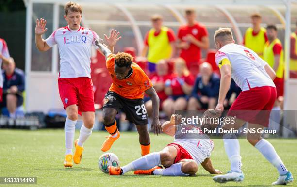Dundee United's Mathew Anim Cudjoe is tackled by Spartans' Jordan Tapping during a Viaplay Cup group stage match between Spartans and Dundee United...