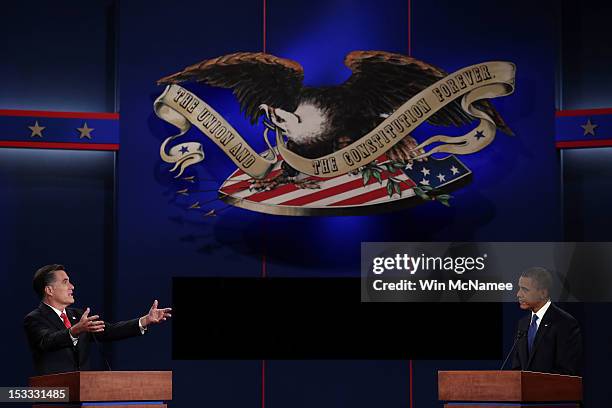 Republican presidential candidate, former Massachusetts Gov. Mitt Romney speaks as Democratic presidential candidate, U.S. President Barack Obama...