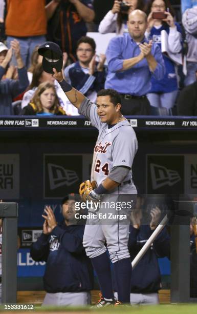 Miguel Cabrera of the Detroit Tigers waves his cap to the crowd as he leaves a game against the Kansas City Royals in the fourth inning at Kauffman...