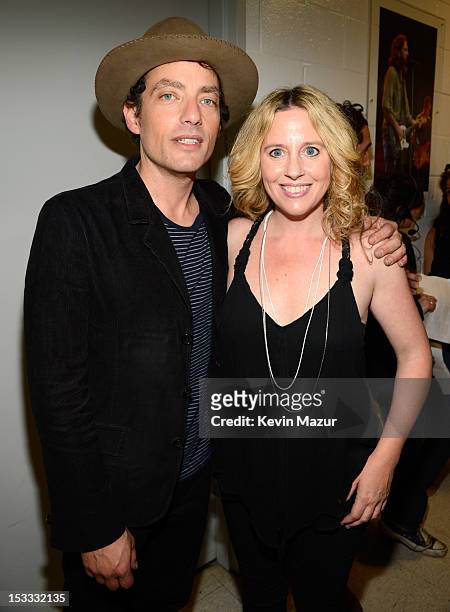 Jakob Dylan and Amy Helm backstage at the "Love For Levon" Benefit To Save The Barn at Izod Center on October 3, 2012 in East Rutherford, New Jersey.