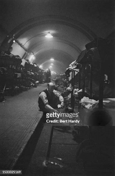 Londoners sheltering in an underground station during an air raid, 1940. Original Publication: Picture Post - 319 - And This Is A London Tube Station...